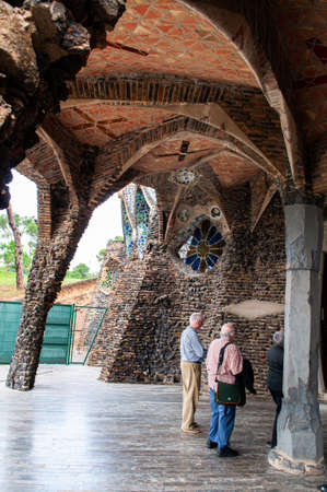 OCT 26, 2012 Barcelona, Spain - Tourists at unfinished vintage Church of Colonia Guell or Gaudi Crypt in La Colonia Guell near Gaudi Crypt. Design by Antoni Gaudiのeditorial素材