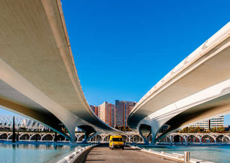 OCT 31, 2012 Valencia, Spain - Modern Architecture of City of Arts and Sciences bridge over blue pool under blue sky. Architecture designed by  Santiago Calatrava and Felix Candelaのeditorial素材