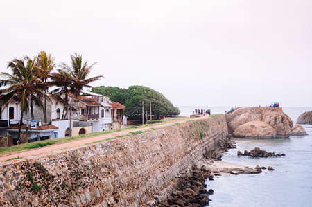 Jul 3, 2012 Weligama, Galle, Sri Lanka - Galle Fort - Flag Rock Bastion fortress and Indian ocean view with tourists
