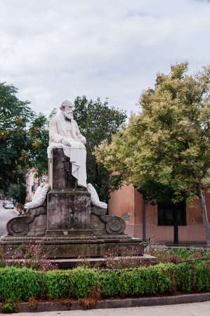 OCT 26, 2012 Barcelona, Spain - Monument of Joan Guell i Ferrer, an industrialist, politician and Spanish economist active advocate of protectionism in La Colonia Guellのeditorial素材