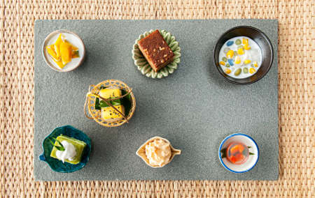 Assorted Thai Desserts made from coconut milk and egg in small cup. top view