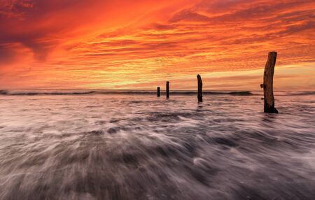 Old jetty ruins at Hallet Cove shot at sunset . Hdr image with long exposureの写真素材