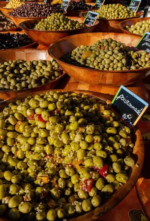 Big bowls of different kind of olives on displayの写真素材