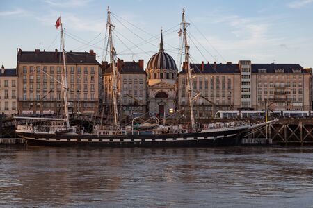 The famous Nantes harbor with a ship shot at sunset