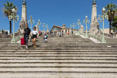 15 Aug 2018. steps and architectural details at marseille saint charles train station showing passengers walking down the stairsのeditorial素材