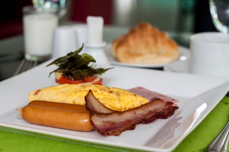 Stuffed Omelet with bacon and chicken sausage  Breakfast の写真素材