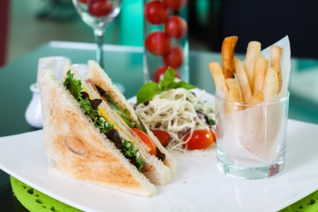 Chicken club sandwiches with potatoの写真素材