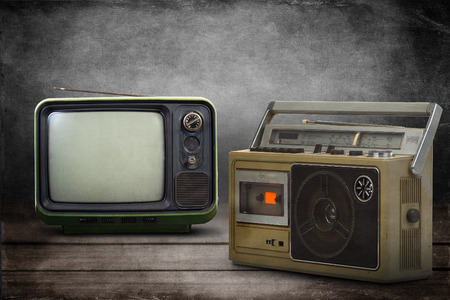 the still life retro ghetto blaster with Vintage style old televisionの写真素材