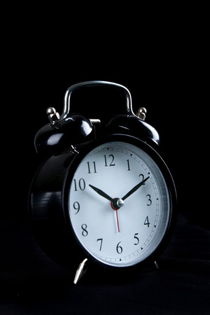 Alarm Clock on black background