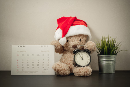 Teddy bear with red santa hat. Christmas conceptの写真素材