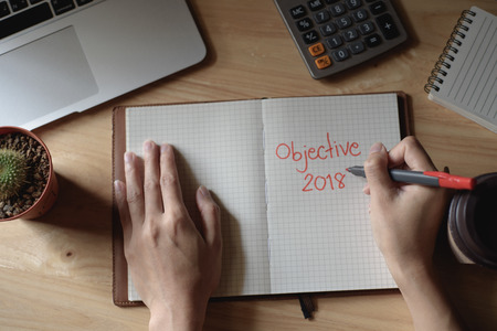 Hand writing wording objective 2018 on notebook.の写真素材