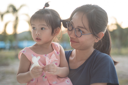 Asian woman and Asian child happiness together.の写真素材