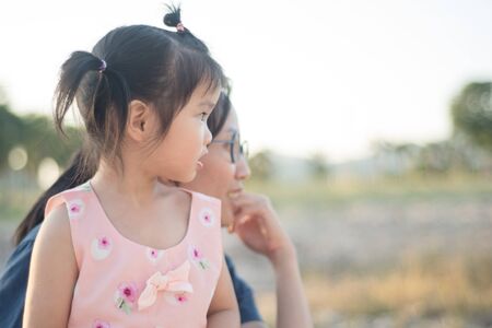 Asian woman and Asian child happiness together.の写真素材