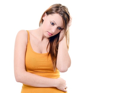 Beautifull woman  holding her neck because of pain, isolated on white backgroundの写真素材