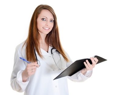 Pretty female doctor isolated writing on scheduleの写真素材