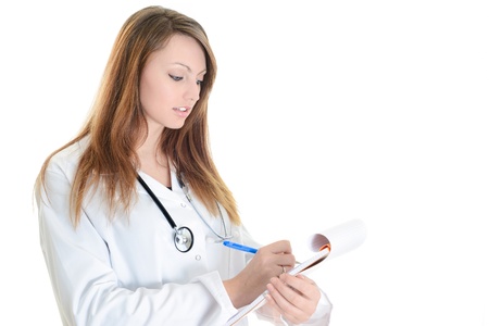 Pretty female doctor isolated writing notesの写真素材