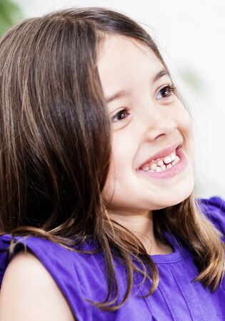 Portrait of very cute smiling childの写真素材