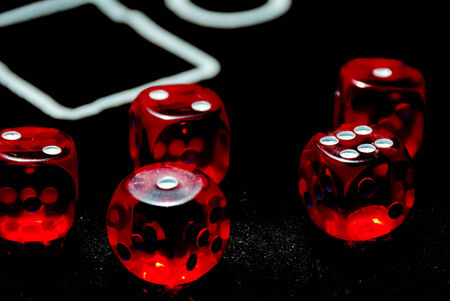 red dices on casino table