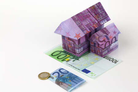 Real estate concept with Euro bank notes House and coinsの写真素材