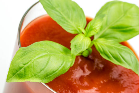 Tomato Juice and Fresh Tomatoes isolated on a White Backgroundの写真素材