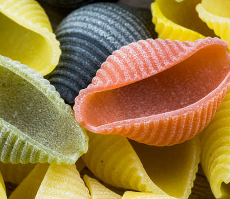Closeup of Uncooked Italian conchiglie pastaの写真素材