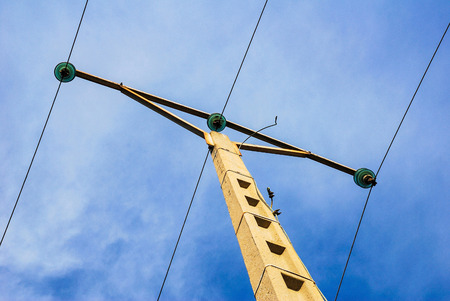 Isolated electric post from belowの写真素材