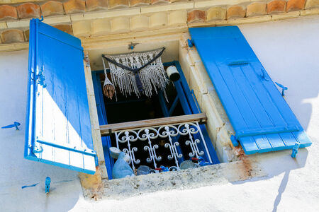 Colorful window on a building in the south of Franceの写真素材