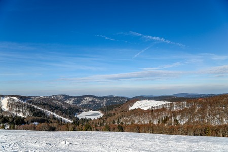 snow skiing landscape of mountains in Vosges, Franceの写真素材