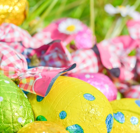 colorful Easter egg Deposited on the prairie grassの写真素材
