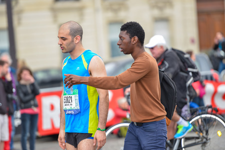 PARIS, FRANCE - APRIL 06: men isolated at Paris International Marathon on April 06, 2014 in Paris, Franceのeditorial素材