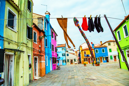 Colorful houses in Burano with the laundry drying on a wireのeditorial素材