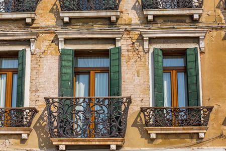 Closeup on windows windows of a typical Venetian house, Italyのeditorial素材