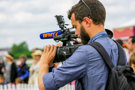 CHANTILLY - JUNE 15: Cameraman filming at the Prix de Diane - The Prix de Diane horse race is a...