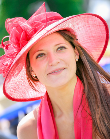 CHANTILLY - JUNE 15: Lovely woman with a pretty hat at the Prix de Diane - The Diana Award is a French horse race qui runs Every year in June. In an atmosphere of sporting fervor and chic picnic Chantilly. Considered the price of elegance and distinction,のeditorial素材