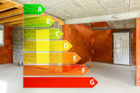 Real ecological house in construction with energy efficiency ratingの写真素材