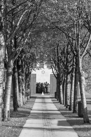 PUTEAUX, FRANCE - MAY 10, 2015:  memorial of the martyrs of the Holocaust in Puteaux on which it is writing in French and Hebrew language (to the martyrs of the Holocaust, peace to Their Souls)のeditorial素材