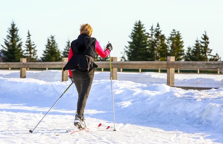 GERARDMER, FRANCE - FEB 20 - Portrait of mature woman skiing outside on Feb 17, 2015 in Gerardmer, Franceのeditorial素材