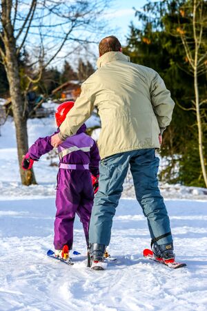 GERARDMER, FRANCE - FEB 17- Closeup on beginner skier during the annual winter school holiday on Feb 17, 2015 in Gerardmer, Franceのeditorial素材