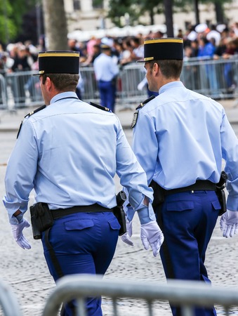 PARIS, FRANCE - JULY 14, 2014: Military parade of National Gendarmerie (Defile) during the ceremonial of french national day, Champs Elysee avenue.のeditorial素材