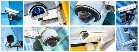Panoramic collage of closeup security CCTV camera or surveillance systemの写真素材