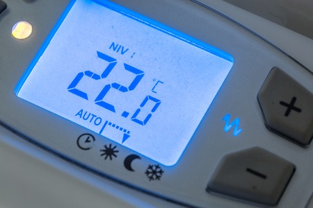 High angle closeup of modern radiator with digital temperatureの写真素材