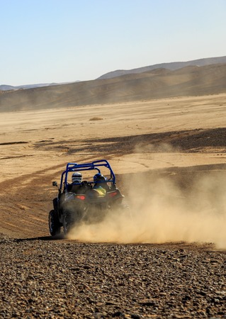 Merzouga, Morocco - Feb 25, 2016: Blue Polaris RZR 800 in Morocco desert near Merzouga. Merzouga is...