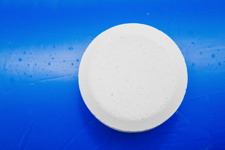 Chlorine Pellets on the edge of an inflatable poolの写真素材
