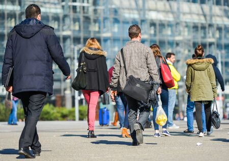 La defense, France- April 09, 2014: workers at the end of their work go to the nearest metro to go...