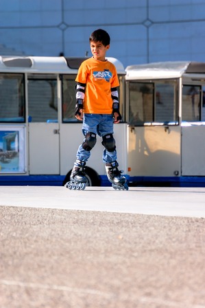 La defense, France- August 30, 2006:Child playing rollerblading in the streetのeditorial素材