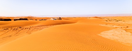 nomad tents in the Sahara with solar panels