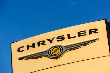 La rochelle, France - August 30, 2016: Official dealership sign of Chrysler against the blue sky. Chrysler is the American subsidiary of Fiat Chrysler Automobiles N.V., an Italian controlled automobile manufacturer registered in the Netherlands with headqのeditorial素材