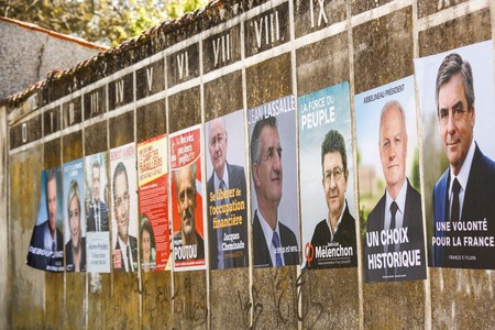 Benon, France- April 18, 2017 : Campaign posters for the 2017 french presidential election in a small villageのeditorial素材