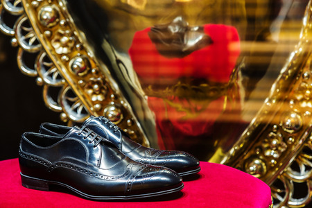 Italy, Venice - March 21, 2015:Men shoes in a luxury store in venice old town centerのeditorial素材