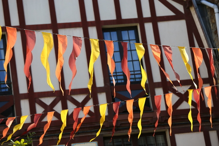 Exterior facade of a typical brittany house with wooden beams and streamers at the forefrontの写真素材